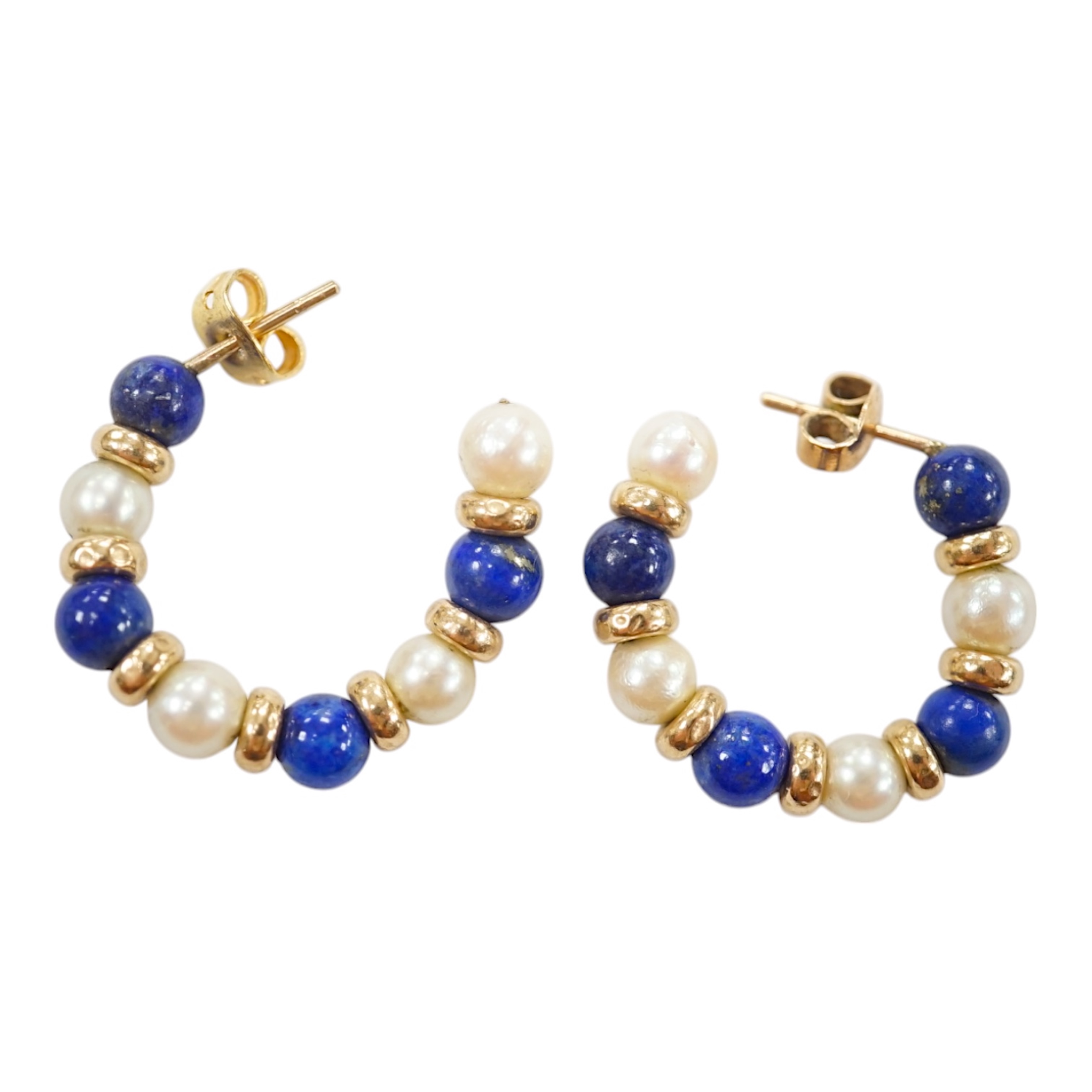 A modern pair of yellow metal lapis lazuli and and cultured pearl cluster set half hoop earrings, 25mm. Condition - fair to good